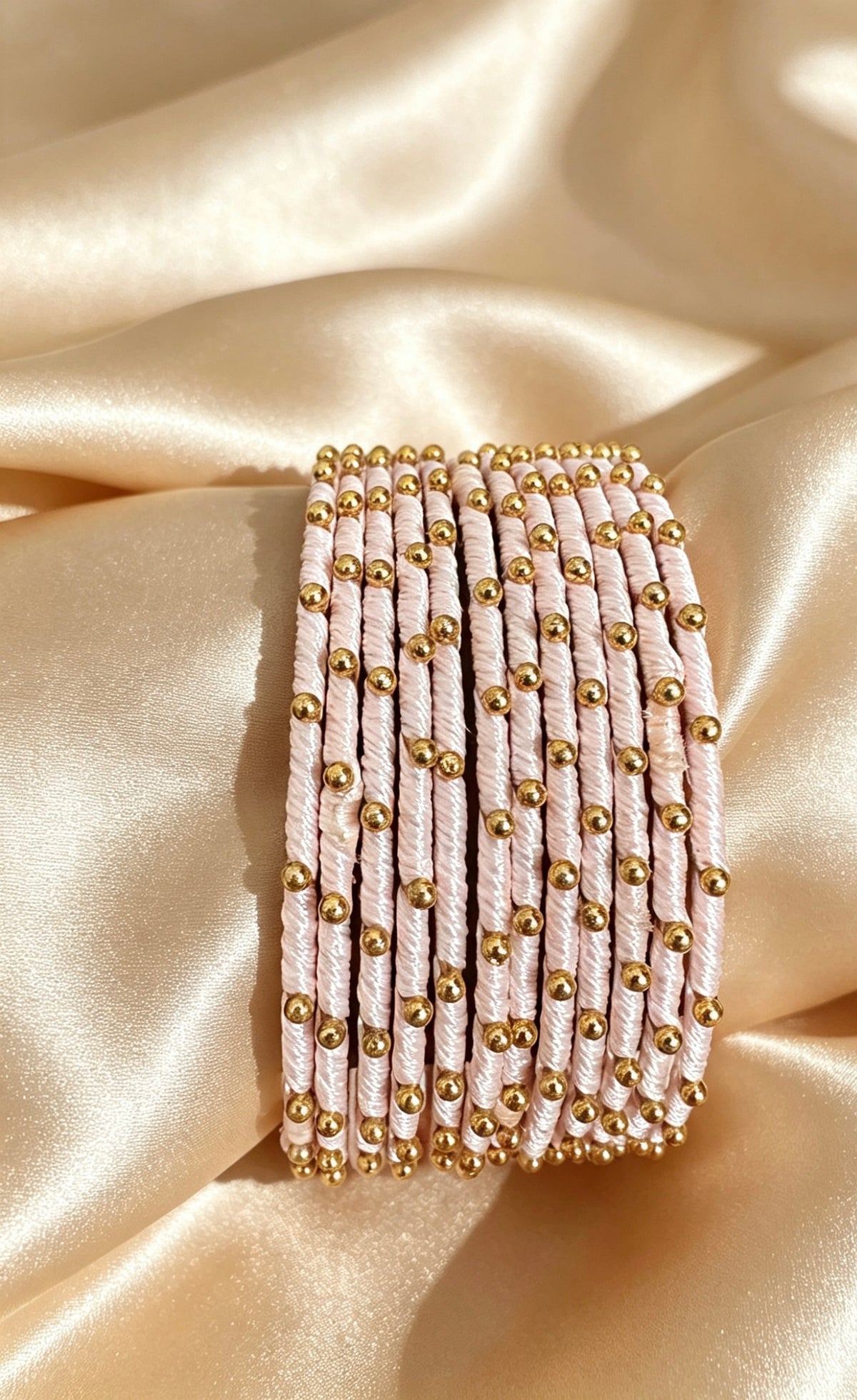 Woven Gold-Accent Metal Bangle Stack