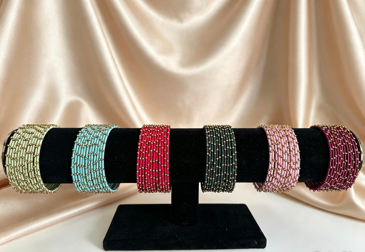 Woven Gold-Accent Metal Bangle Stack