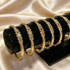 Regal Gemstone Gold Bangle   2.8"