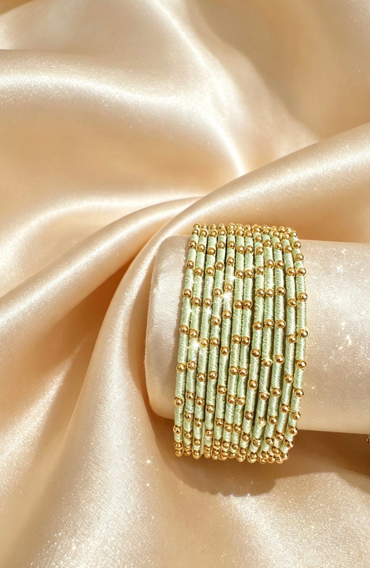 Woven Gold-Accent Metal Bangle Stack