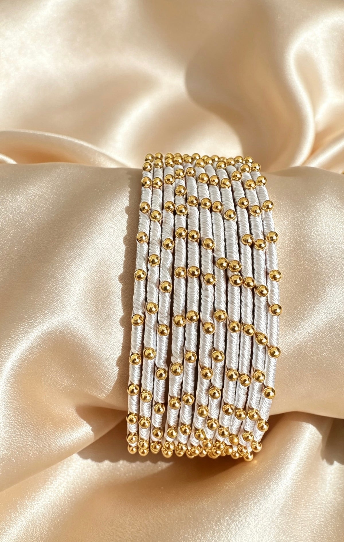 Woven Gold-Accent Metal Bangle Stack
