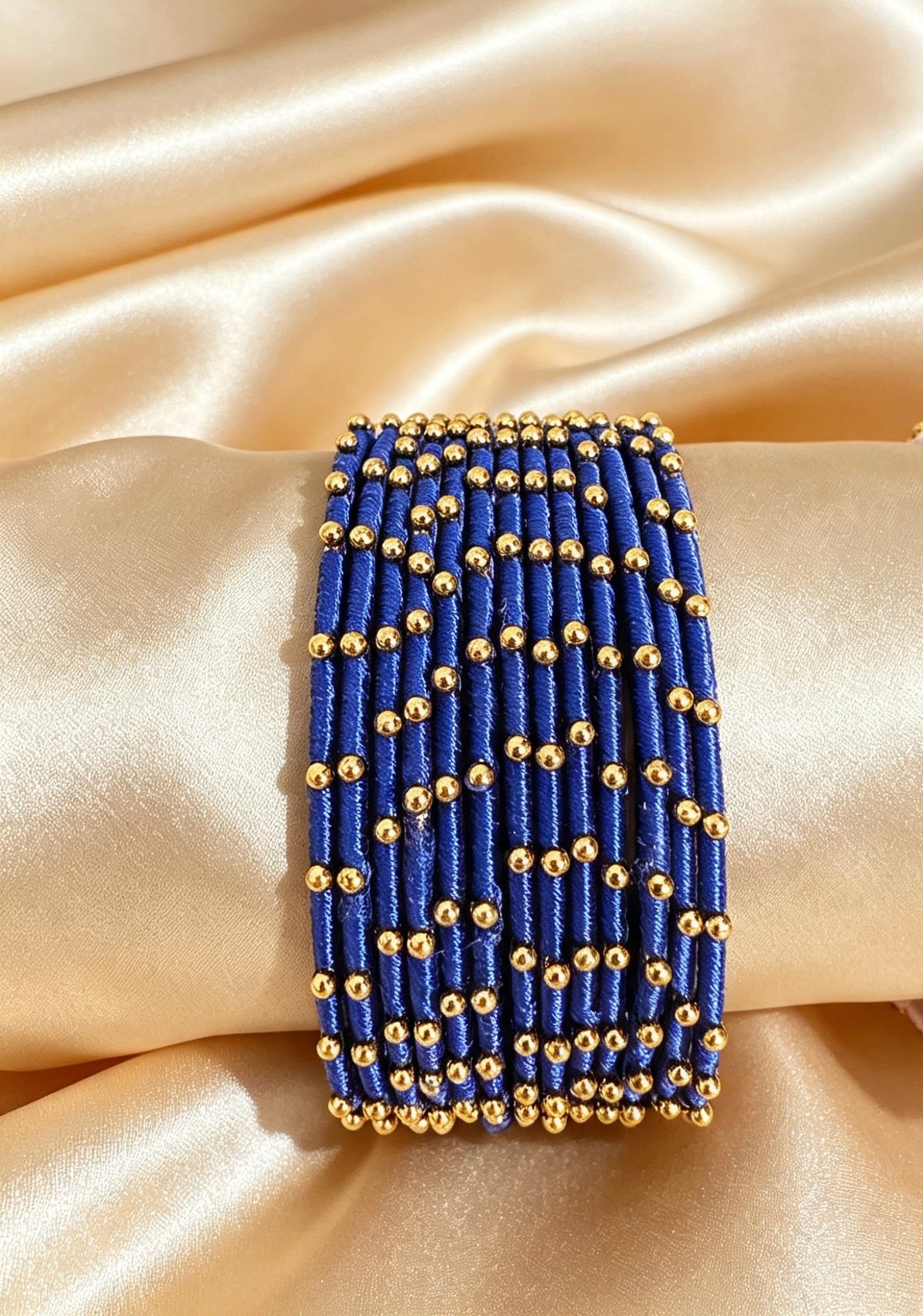 Woven Gold-Accent Metal Bangle Stack