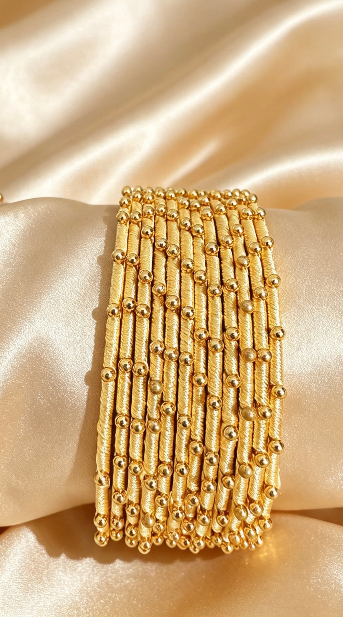 Woven Gold-Accent Metal Bangle Stack