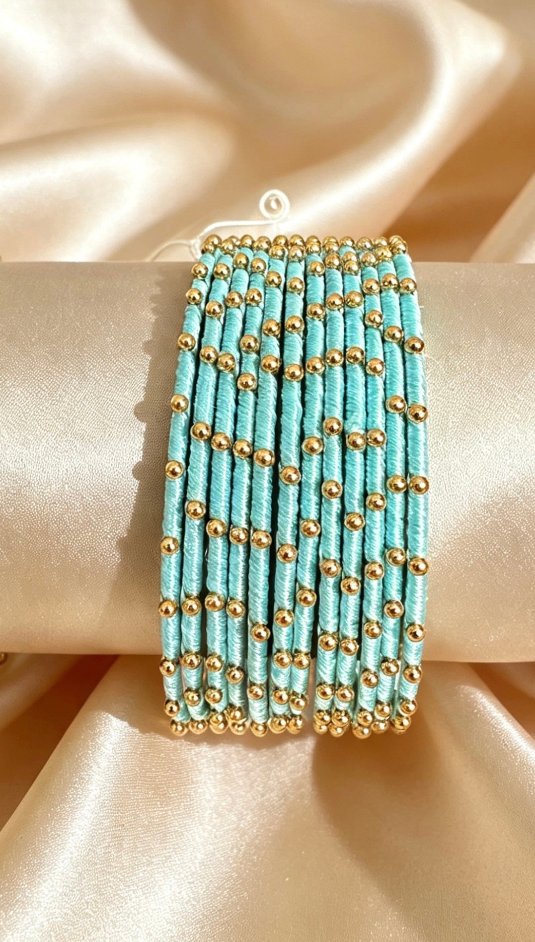 Woven Gold-Accent Metal Bangle Stack