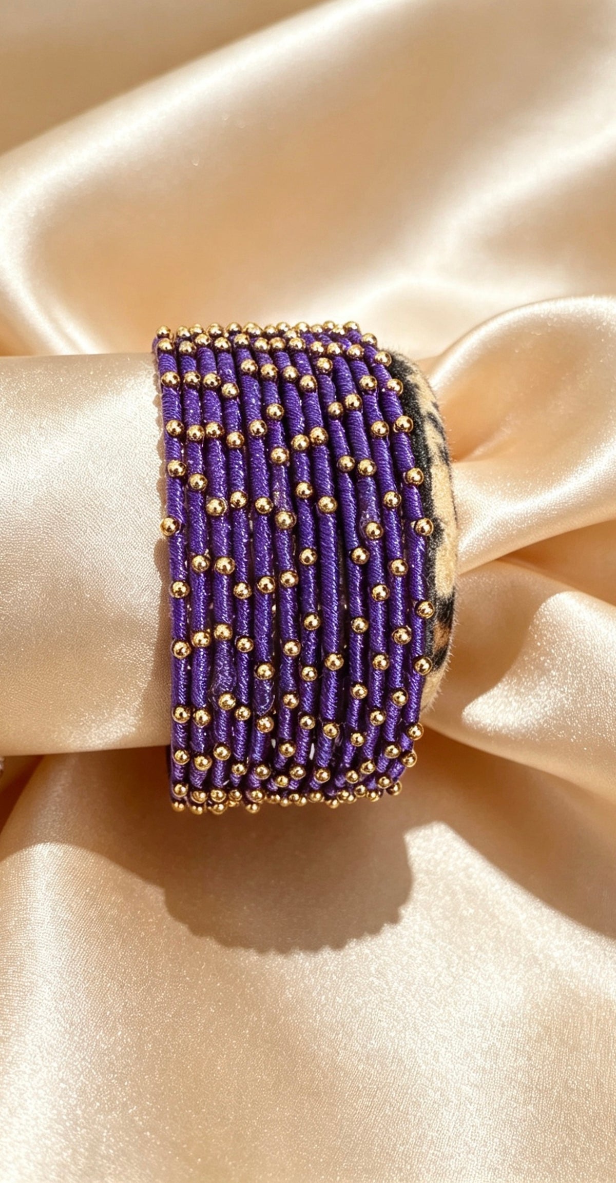 Woven Gold-Accent Metal Bangle Stack